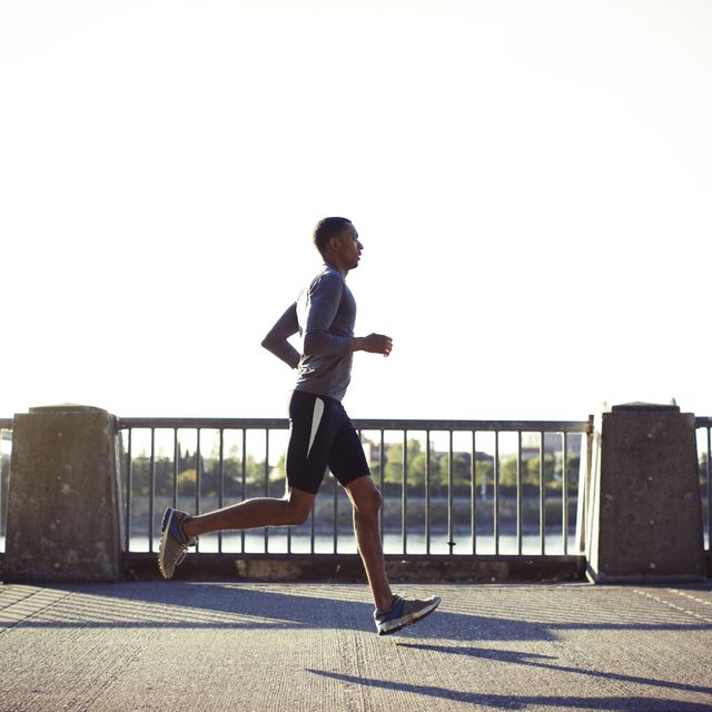 a man running in the city.