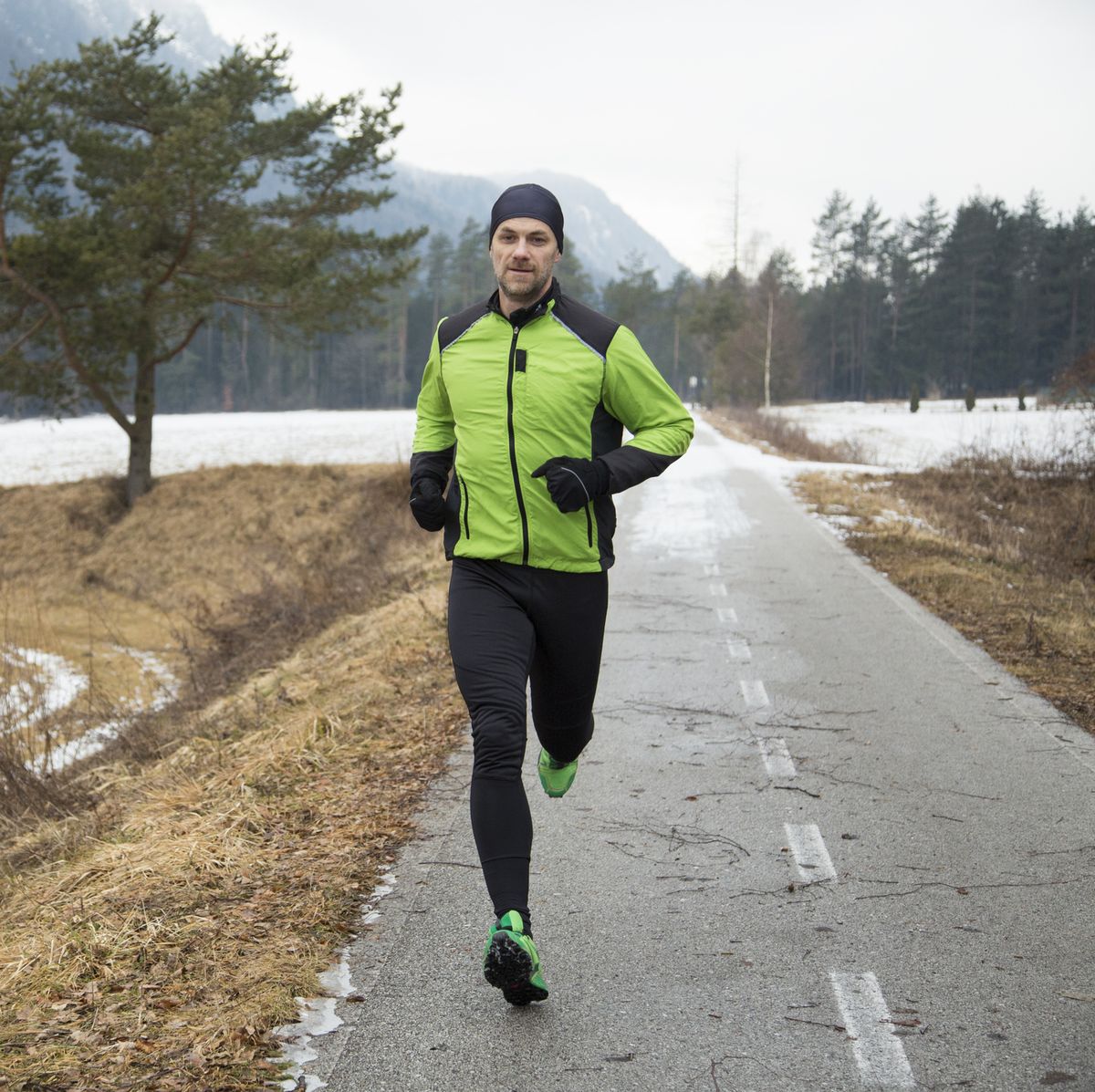 man running on road, highintensity exercise may stave off cancer