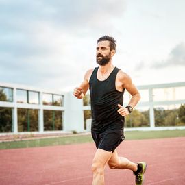 man running on the track to keep fit