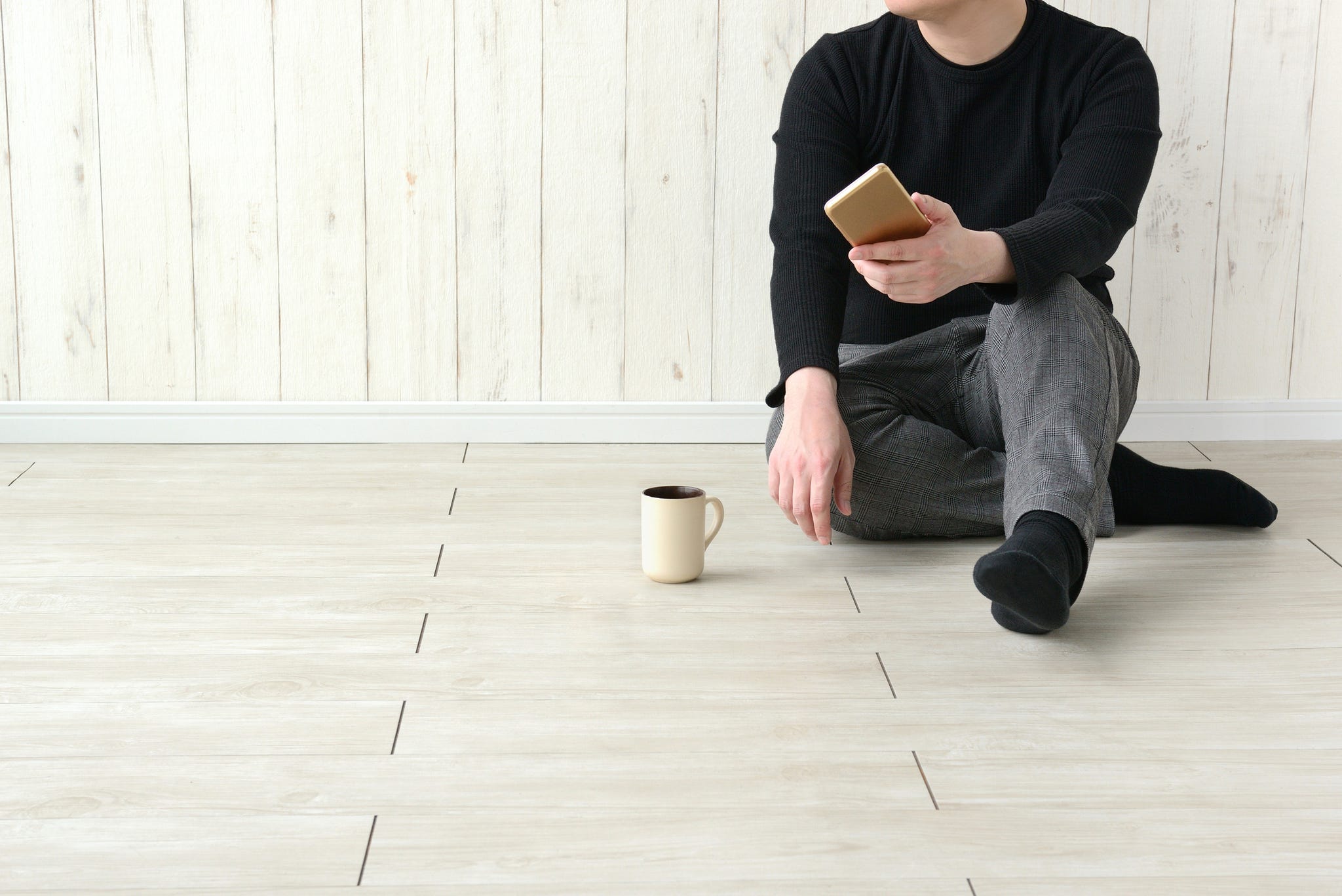 man sitting and thinking alone in living room