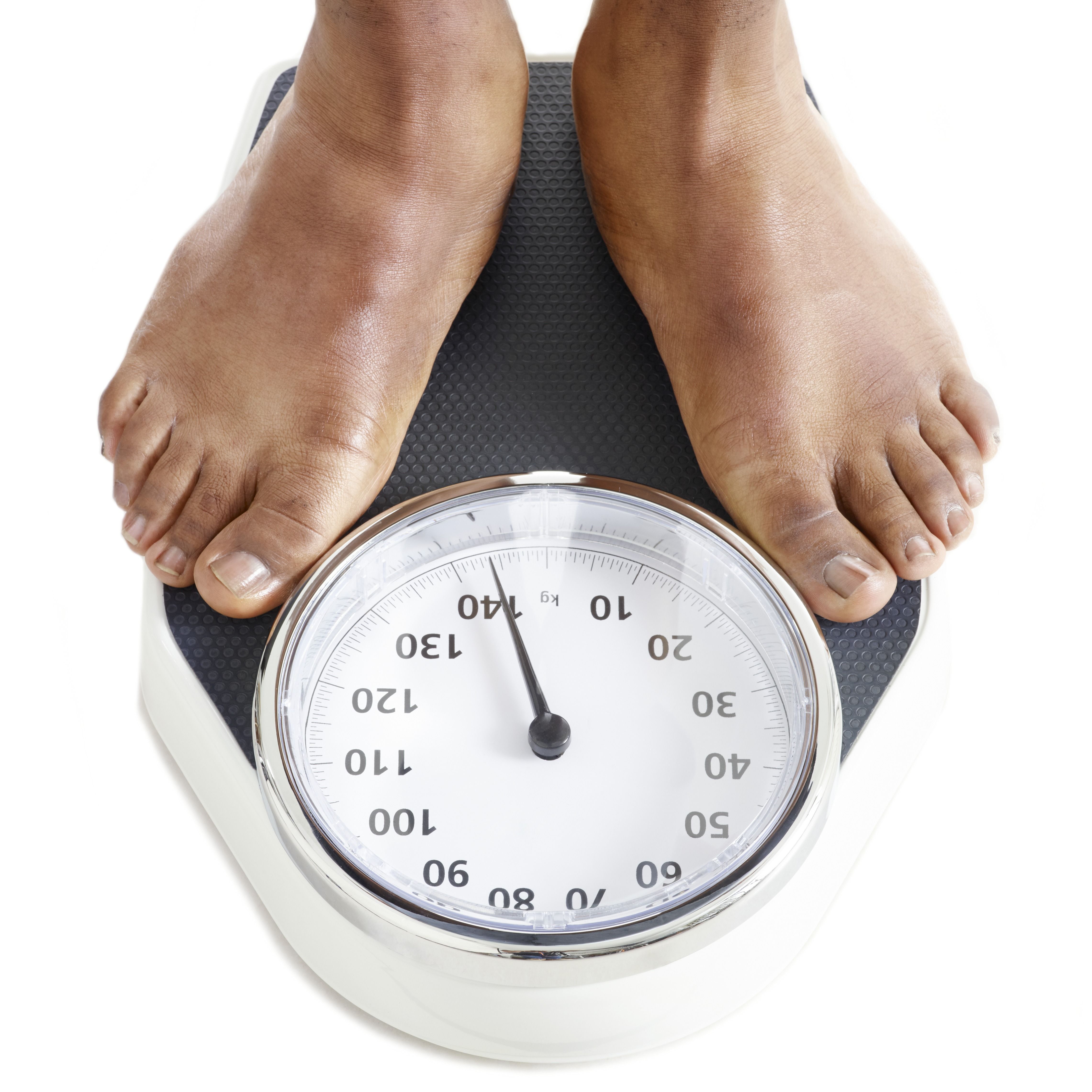 Things That Weigh About 130 Kilograms   Things That Weigh About 130 Kilograms man standing on weighing scales royalty free image 1593466717