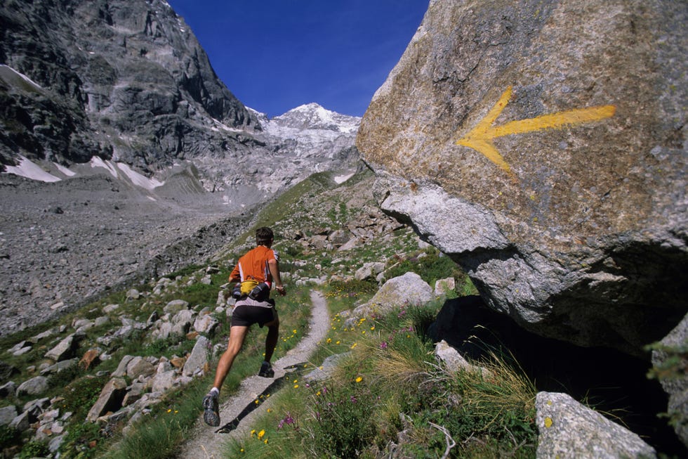 man trail running in val de malatra, courmayeur, italy
