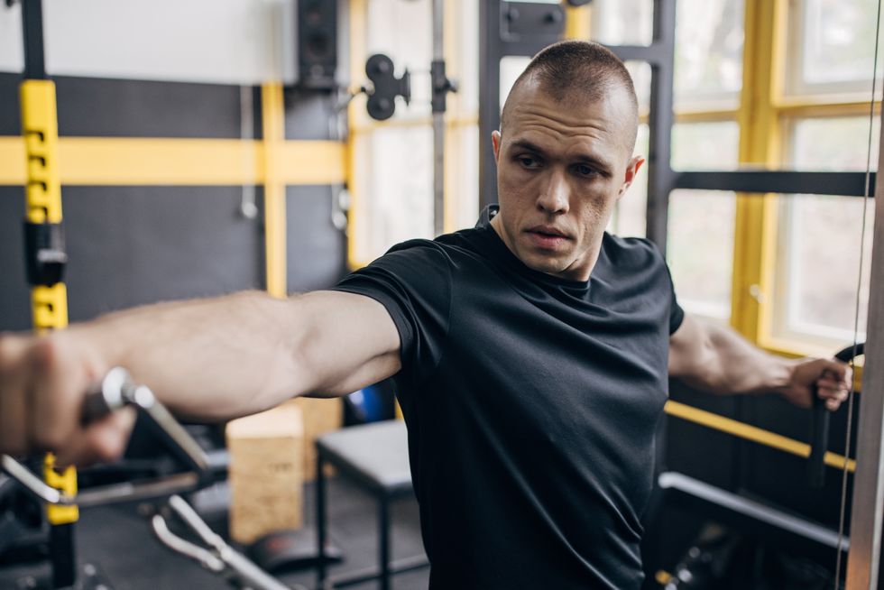 man training on exercise machine