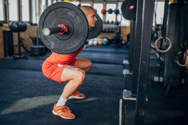 https://hips.hearstapps.com/hmg-prod/images/man-training-on-with-weights-in-gym-royalty-free-image-1675983289.jpg?crop=1.00xw:0.752xh;0,0.0697xh&resize=640:*