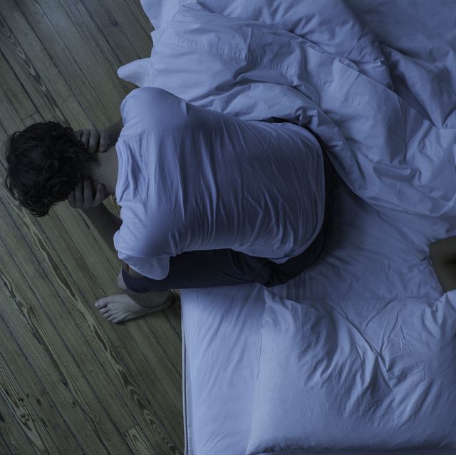 man unable to sleep while wife sleeps comfortably unaware