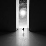 man walking through interdimensional passage