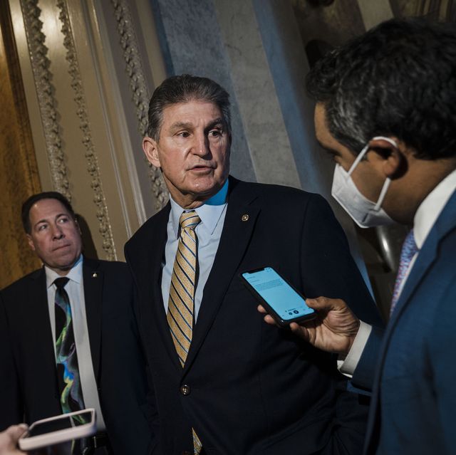 washington, dc   february 17 sen joe manchin d wv stops to chat with reporters outside the senate chamber on capitol hill on thursday, feb 17, 2022 in washington, dc  kent nishimura  los angeles times via getty images