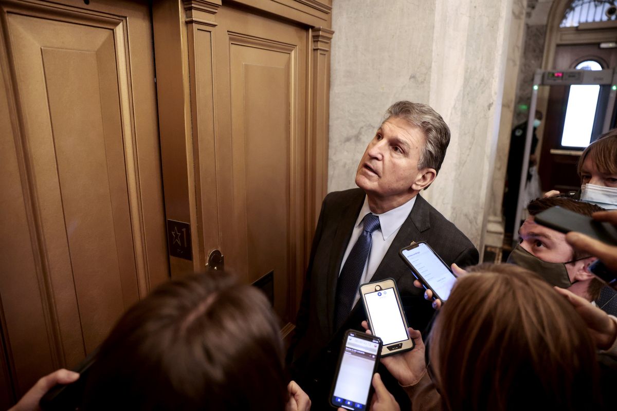 washington, dc   december 15 sen joe manchin d wv speaks to reporters as he leaves the senate chambers following a vote on december 15, 2021 in washington, dc the senate voted to pass the national defense authorization act, which sends the bill to the desk of us president joe biden photo by anna moneymakergetty images