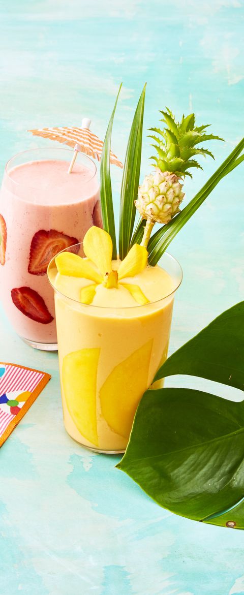 mango smoothie with a mini pineapple as garnish