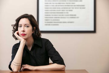 a woman sitting at a desk