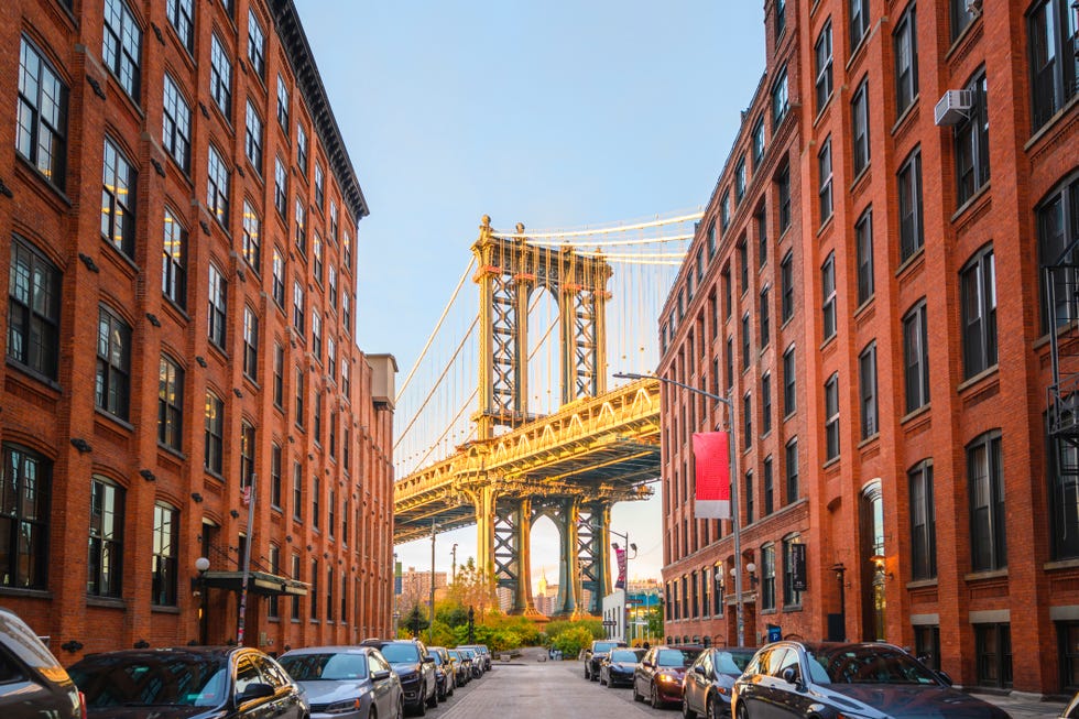 manhattan bridge at sunset seen from dumbo, brookyn, new york city