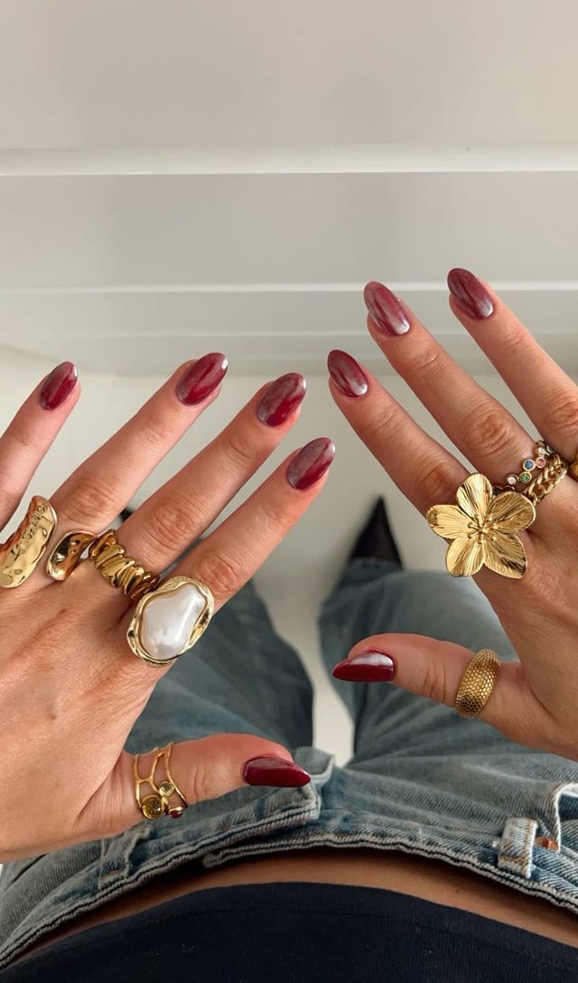 Cherry manicure with chrome effect