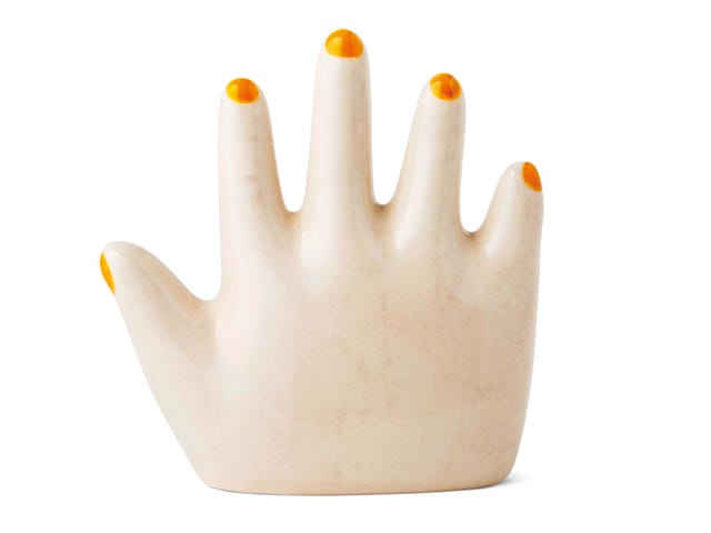 Figura decorativa de mano