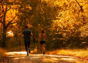 Dan Roe and Amanda Furrer running downhill in Emmaus, PA.