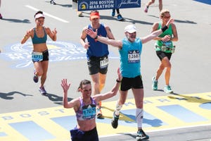 boston, ma 041816 runners cheers as they cross the finish line of the 2016 boston marathon on boylston street on monday, april 18, 2016 staff photo by nicolaus czarnecki photo by nicolaus czarmeckimedianews groupboston herald via getty images