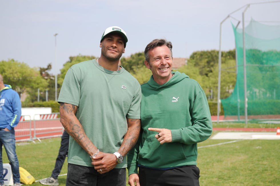 lamont marcell jacobs and coach paolo camossi during the inauguration of a new athletics track before the gold stage of the world athletics tour in desenzano del garda, on april 29, 2023 photo by stefano nicolinurphoto via getty images