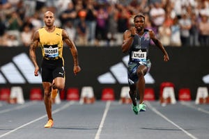 usas noah lyles r runs to first place ahead of italys lamont marcell jacobs in the mens 100m event during the iaaf diamond league meeting de paris athletics meeting at the charlety stadium in paris on june 9, 2023 photo by jeff pachoud afp photo by jeff pachoudafp via getty images