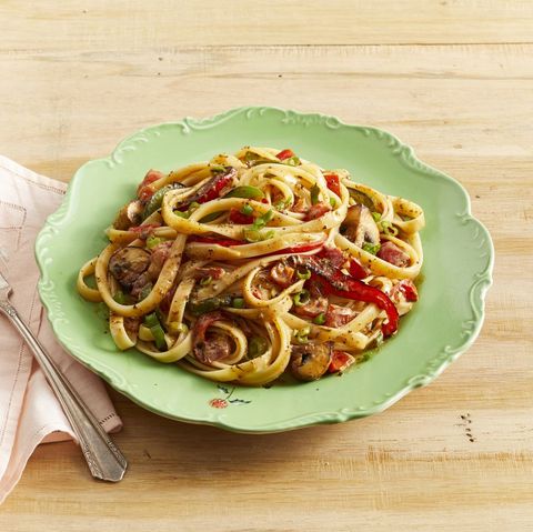 mardi gras foods recipes cajun pasta with veggies in green bowl