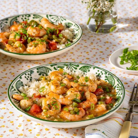 mardi gras foods recipes shrimp etouffee in green and white bowl