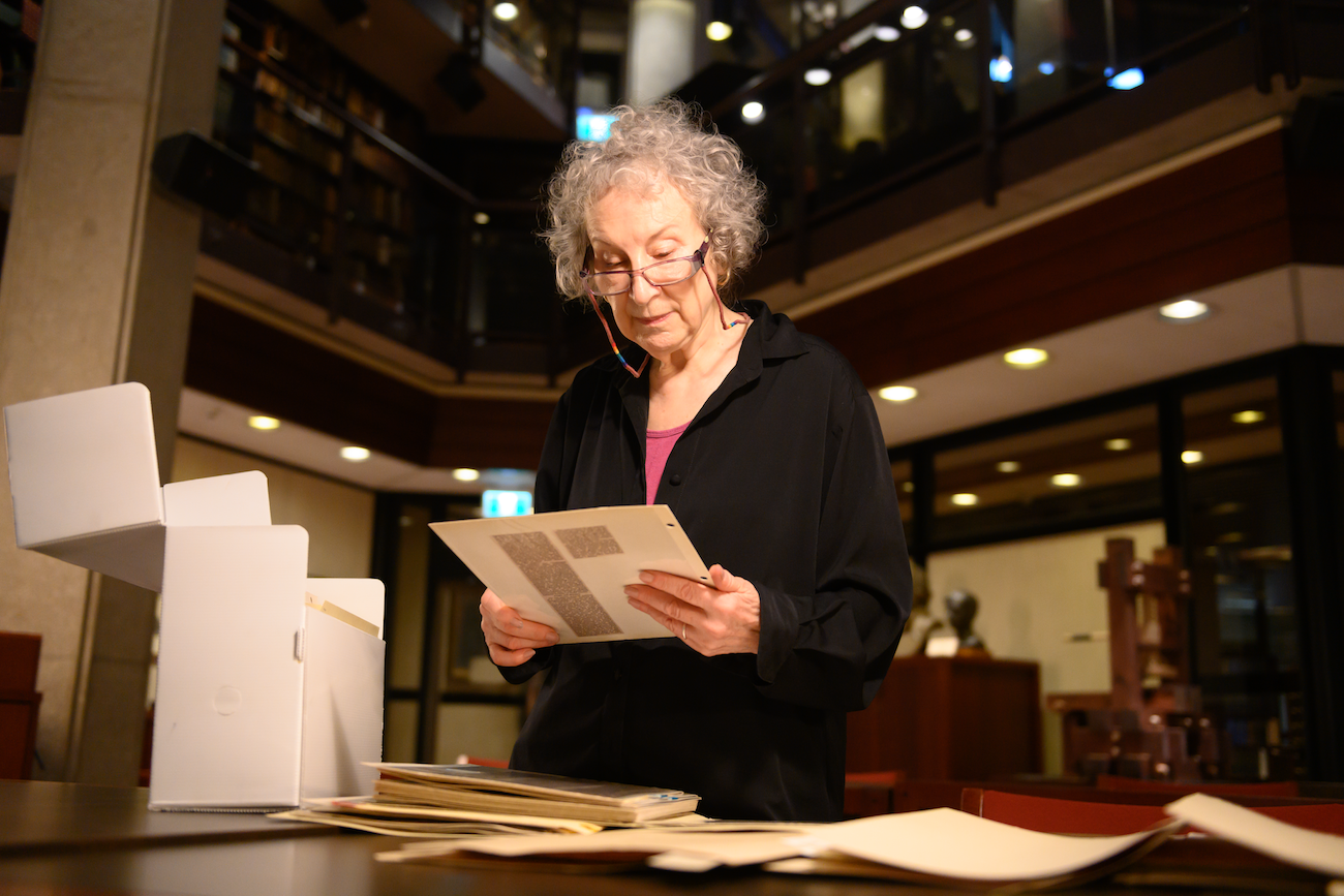 Margaret Atwood examining research clippings for ‘The Handmaid’s Tale’