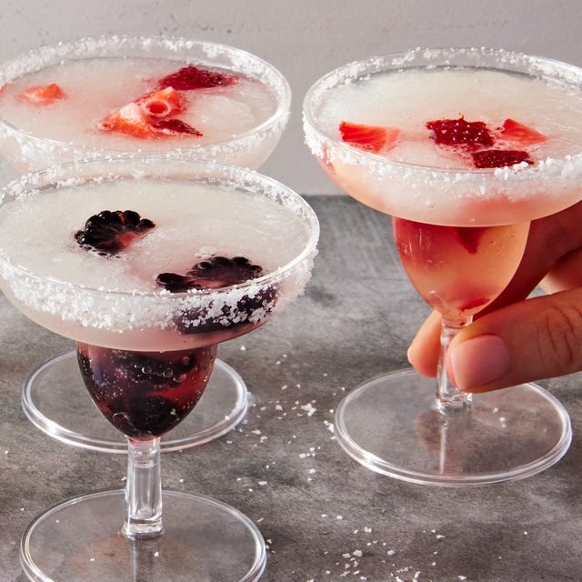 Margarita Slushy Shots blackberry, raspberry, pineapple, and strawberry slushy margaritas in margarita style shot glasses