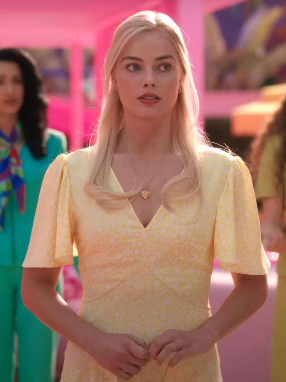 The Barbie Movie Margot Robbie S Yellow Dress Significance Explained