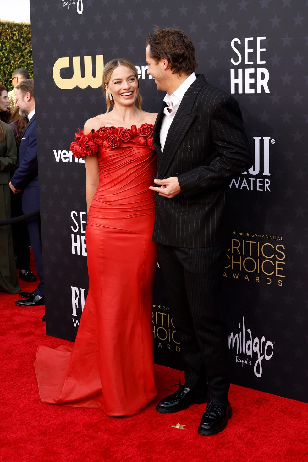 Margot Robbie Wears Red Balmain Dress to 2024 Critics Choice Awards