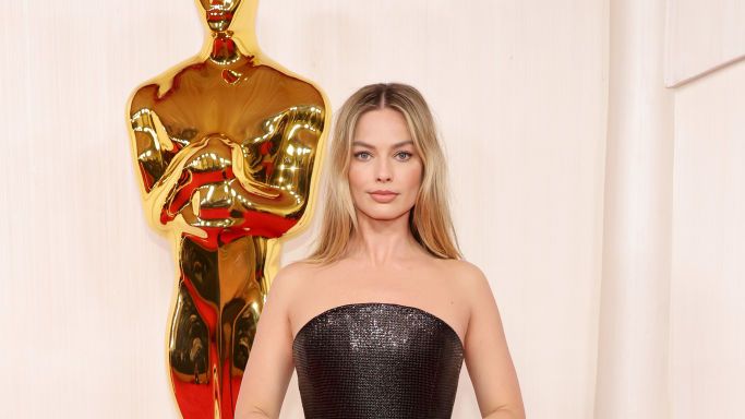 Margot Robbie Wears Black Versace Gown at the 2024 Oscars