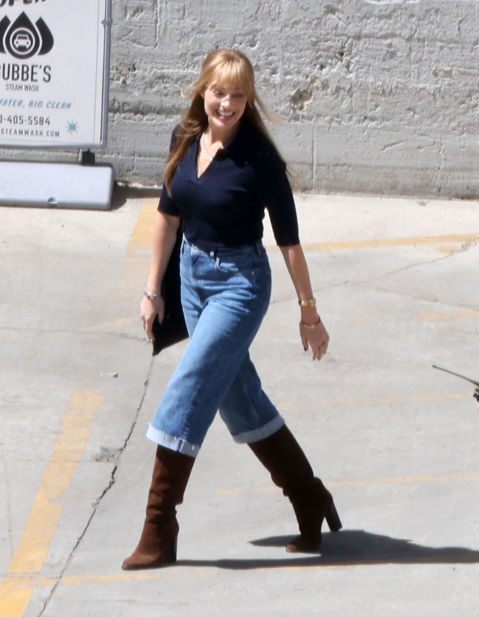 a person in jeans and boots