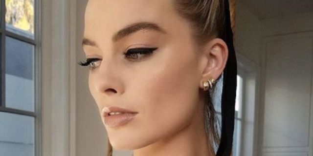 This is the exact lipstick Margot Robbie wore to the Chanel Cruise SS23/24  show