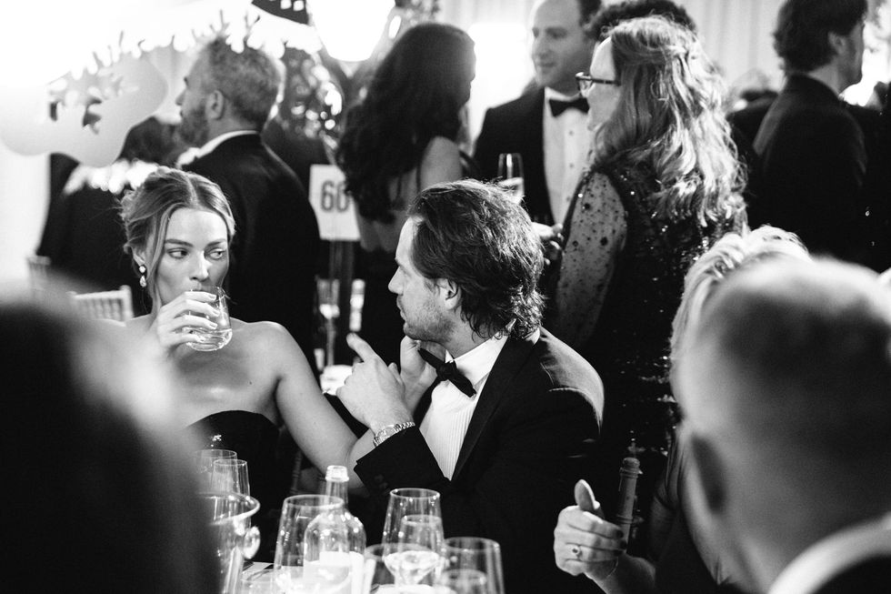 margot robbie and tom ackerley at the baftas