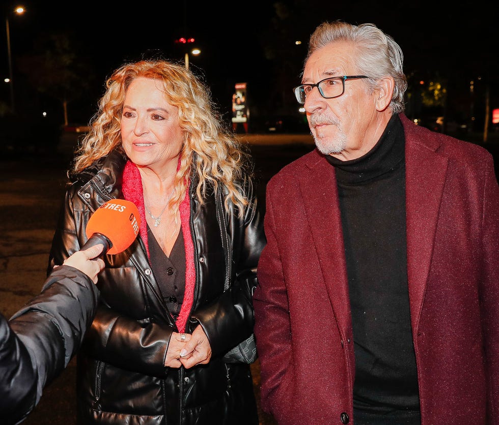 a man and woman posing for a picture