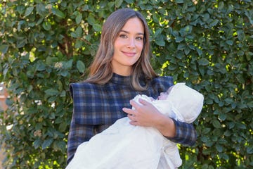 a person holding a baby