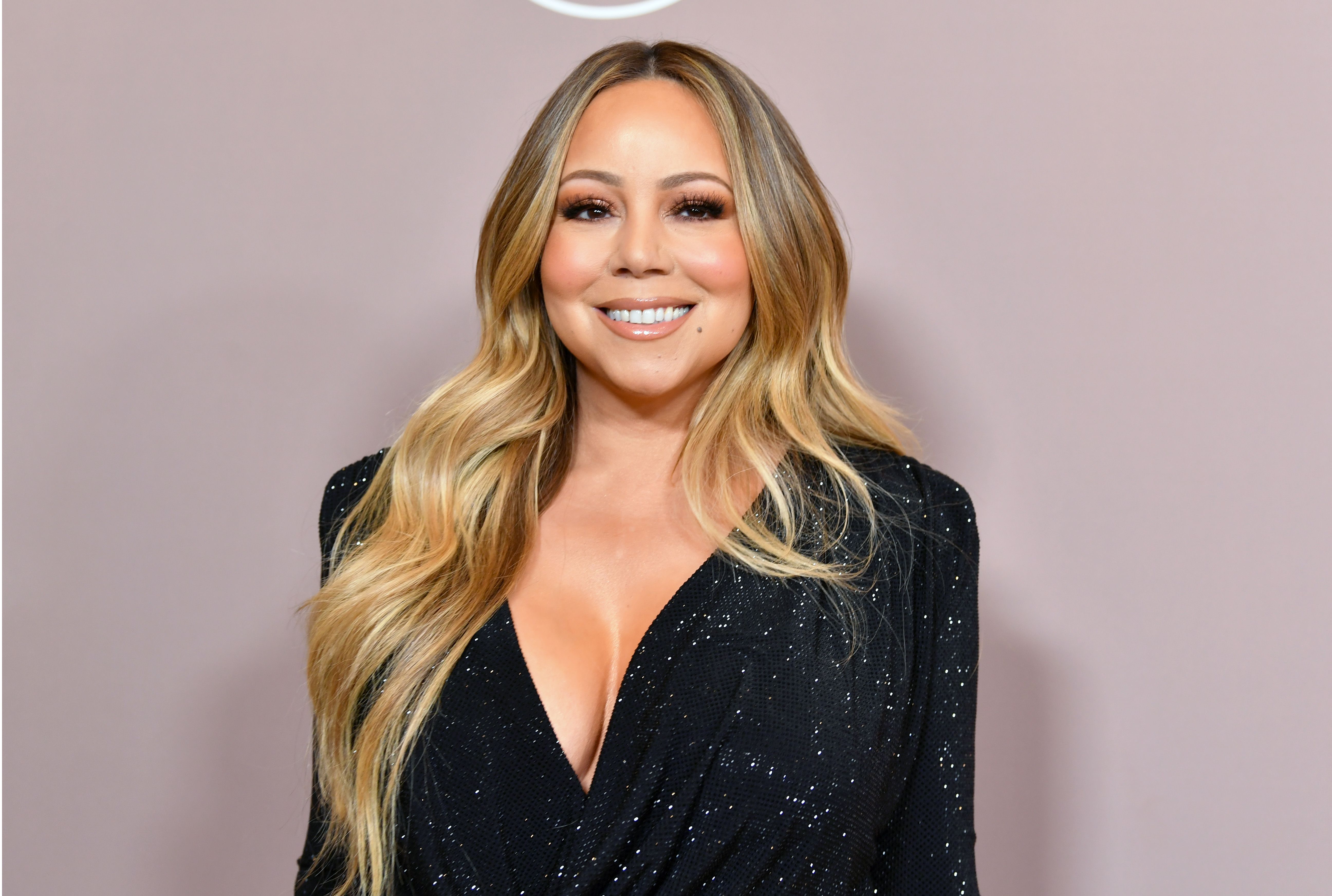 Songbird Mariah Carey hosts her official end of tour party at Haze  Nightclub at ARIA Resort & Casino. Carey wore a revealing skintight mini  dress and sunglasses on the red carpet. Las