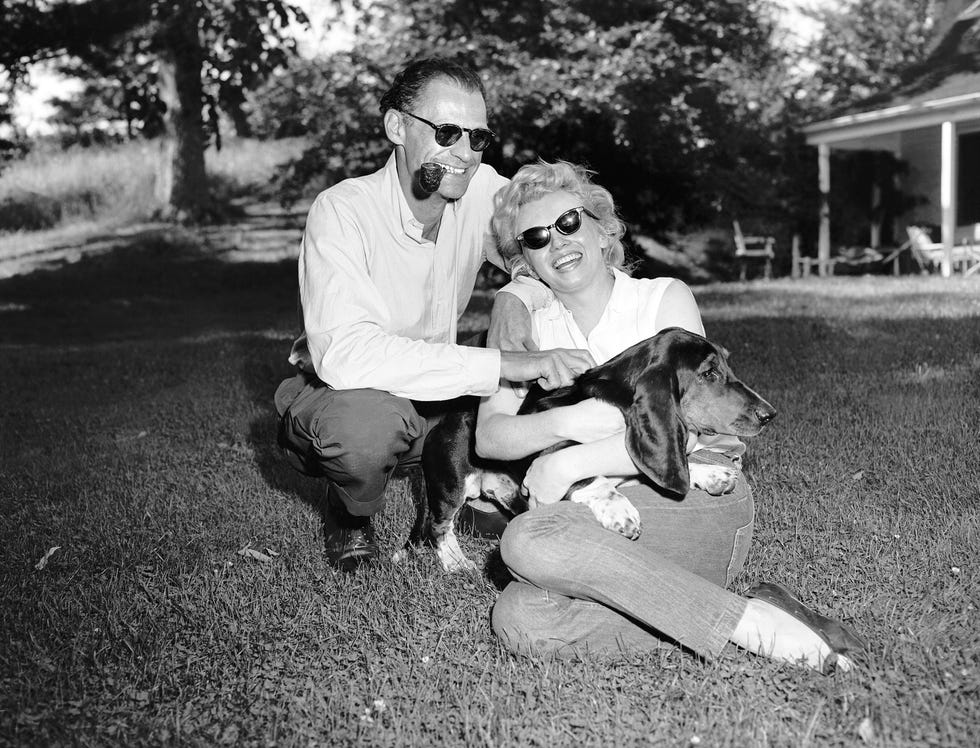 marilyn monroe, arthur miller and his dog hugo at miller's h