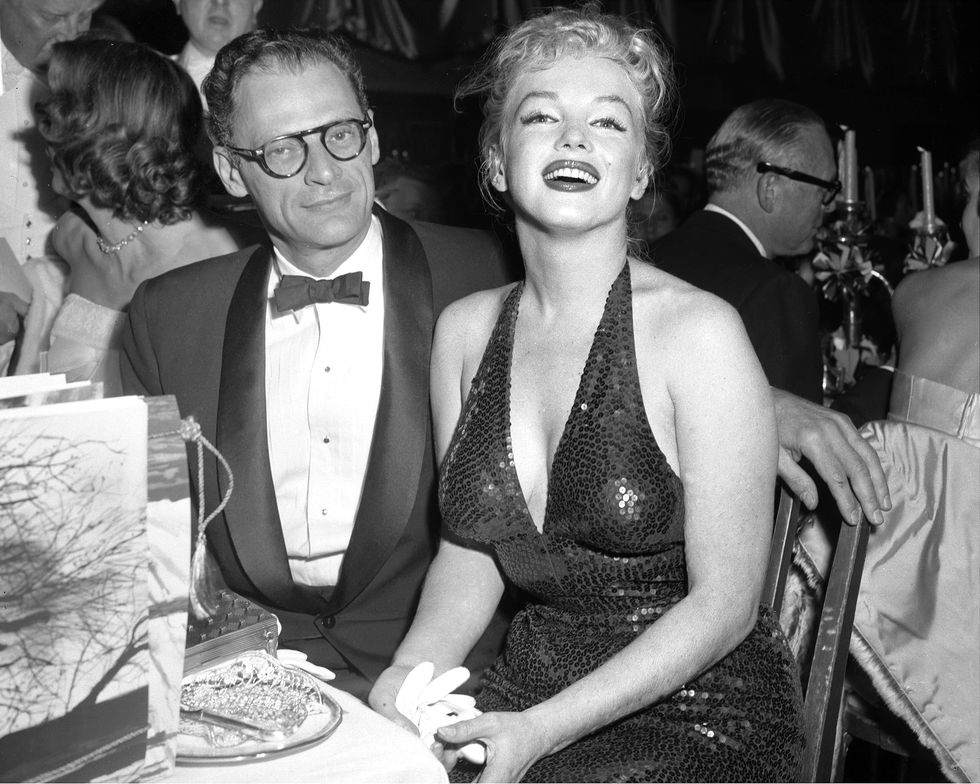 marilyn monroe, glamourous as ever, and her husband, playwri