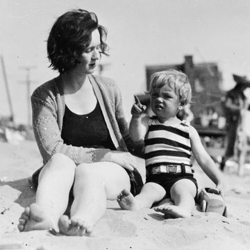 gladys baker with norma jeane baker, the future marilyn monroe, who was then around the age of 3, the pair are sitting on the sand at a beach