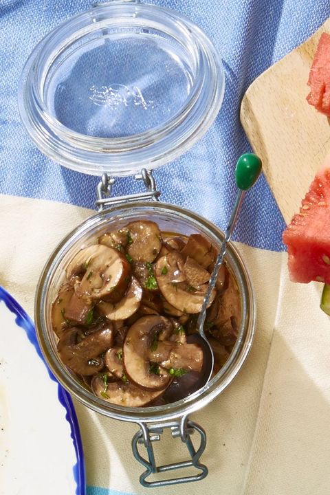 vegan marinated mushrooms in a glass jar