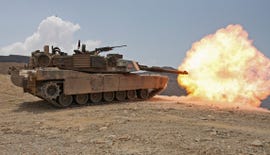 marines bombard through a live fire range using m1a1 abrams tanks