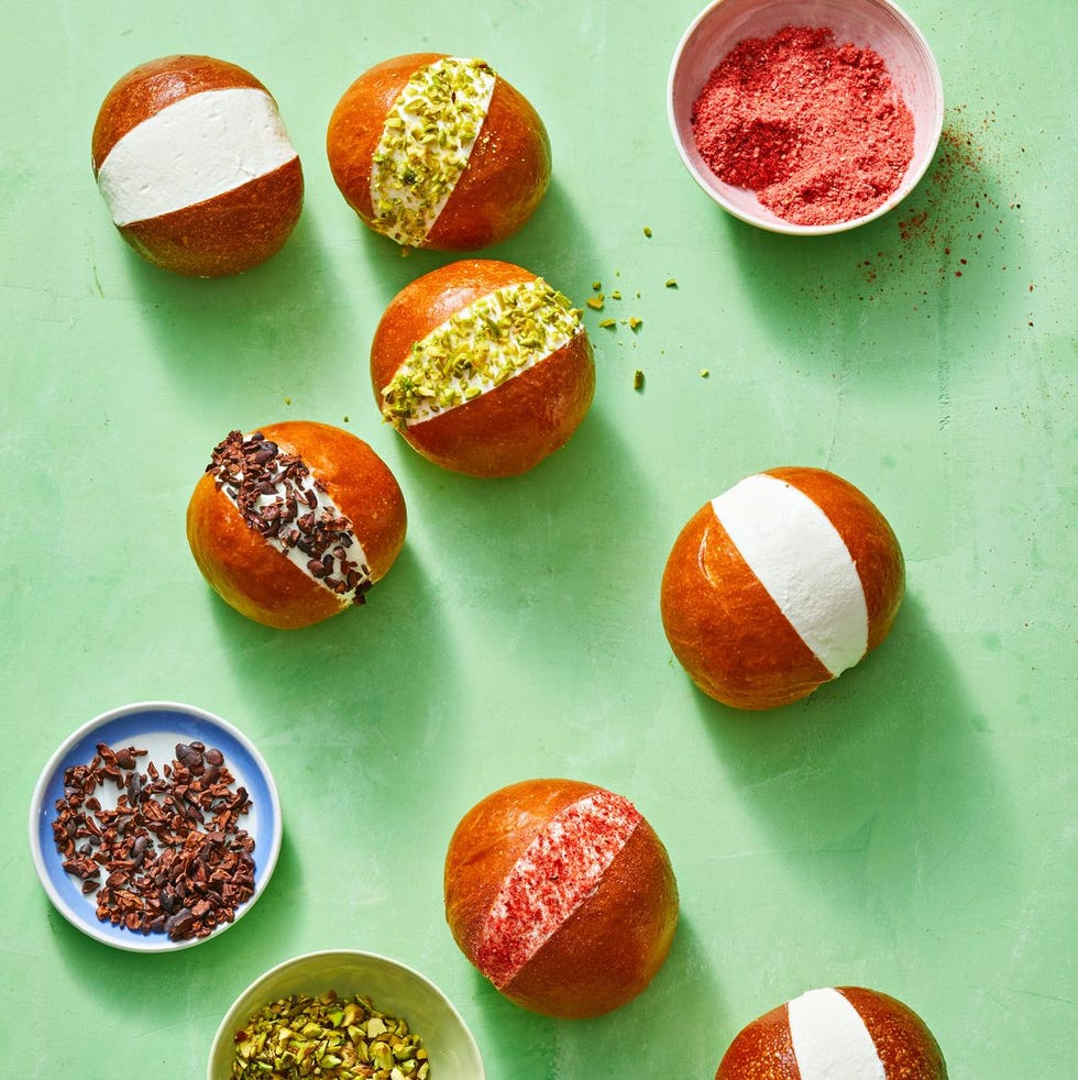 maritozzi with whipped cream and toppings in the center