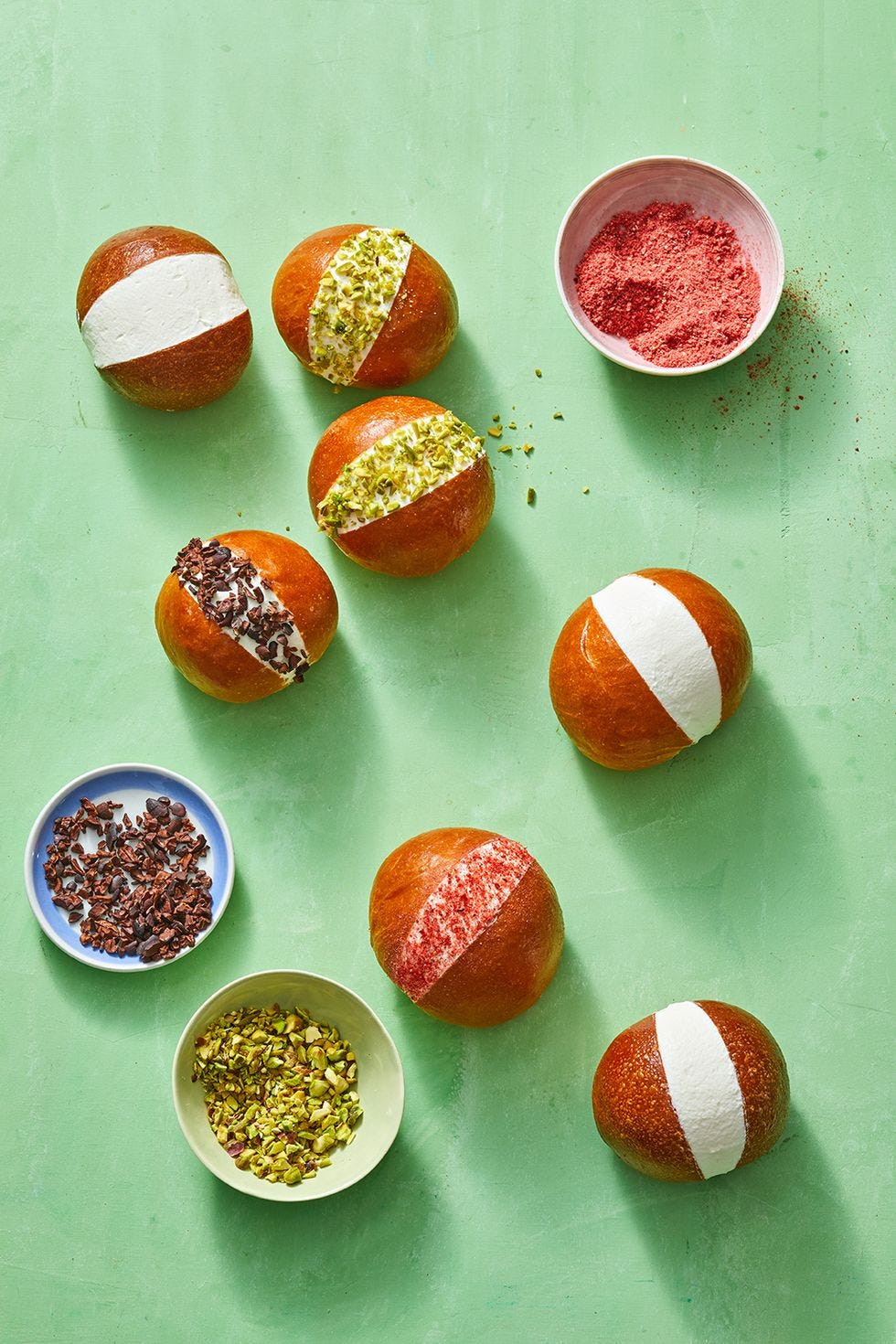 brioche puffs with cream and toppings in the center
