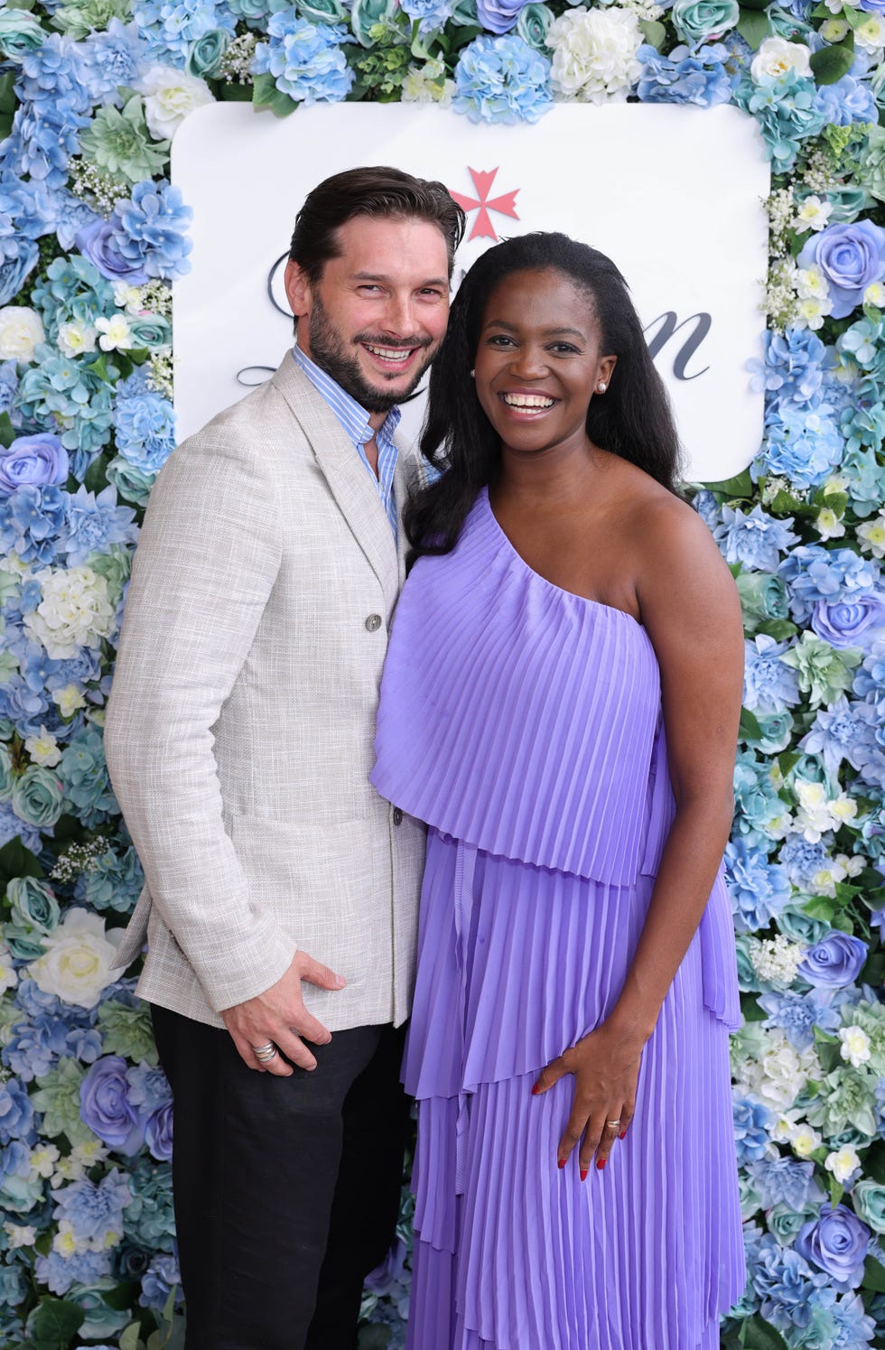 marius iepure and oti mabuse posing next to each other and smiling