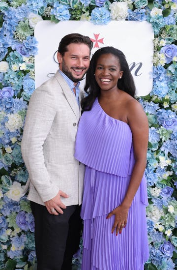 marius iepure and oti mabuse posing next to each other and smiling