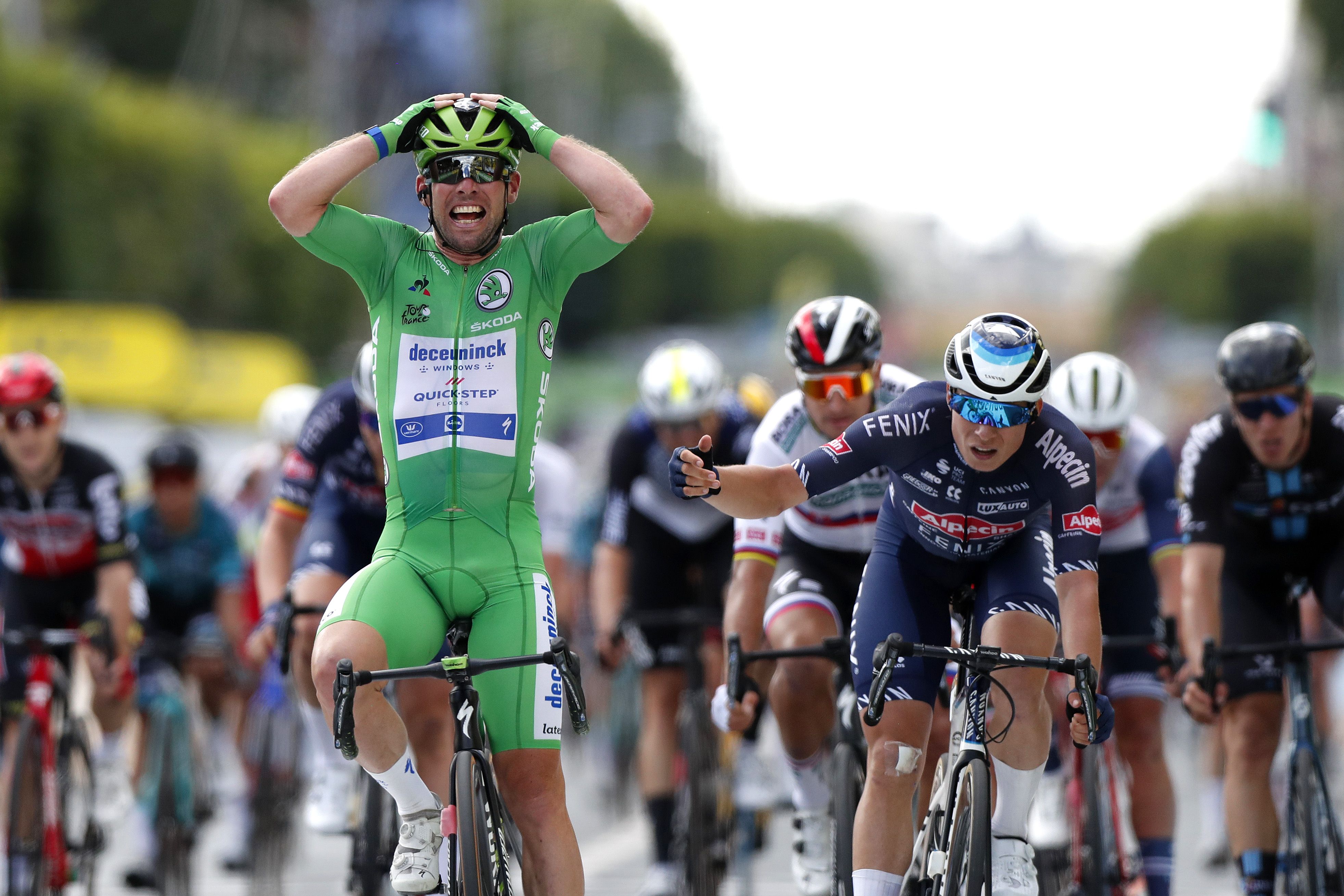 Mark Cavendish celebrates his Stage 6 win.