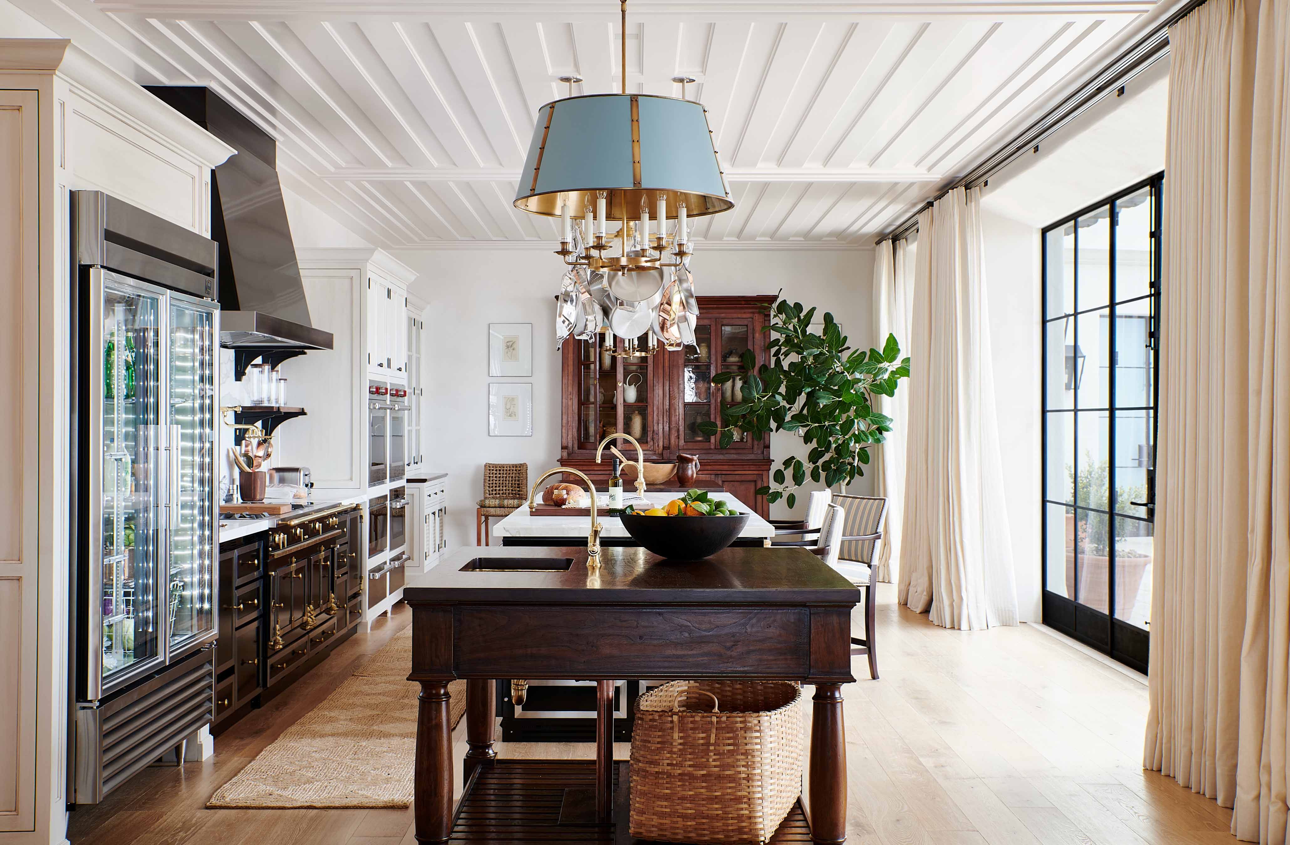 Bertazzoni appliances in a White and gold kitchen with Marble