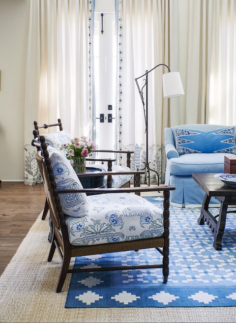 in the living room, english arts and crafts–inspired bobbin chairs aesthetic decor are fitted with quadrille cushions