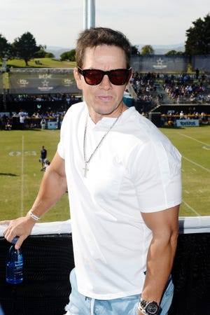 Mark Wahlberg Attends The Dallas Cowboys Training Camp To Announce Wahlburgers Opening At The Star In Frisco