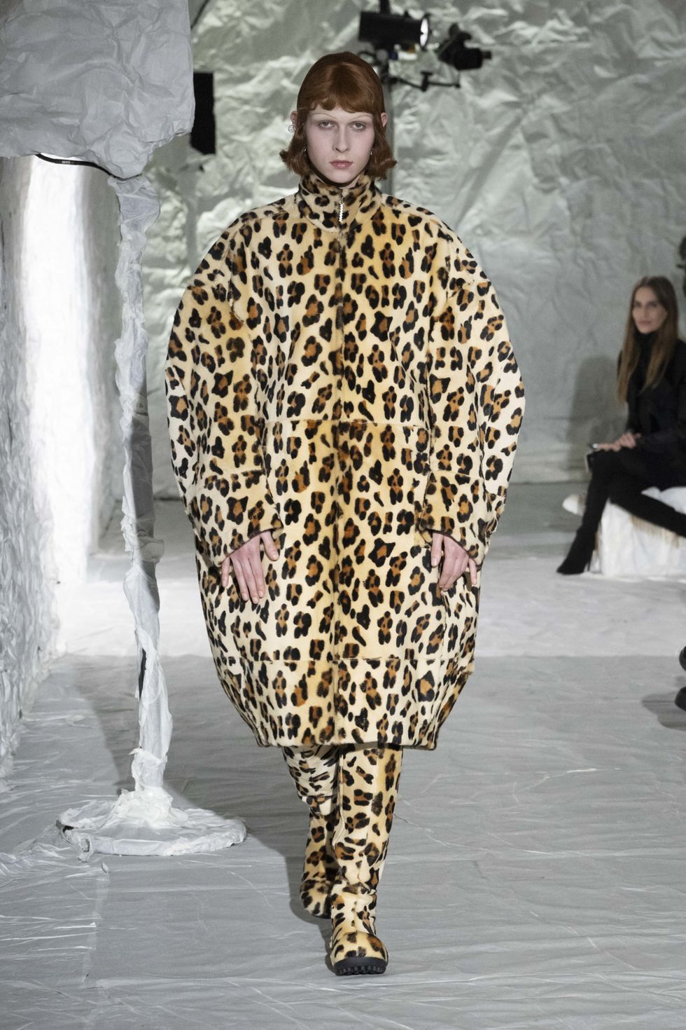 a person wearing a leopard print dress