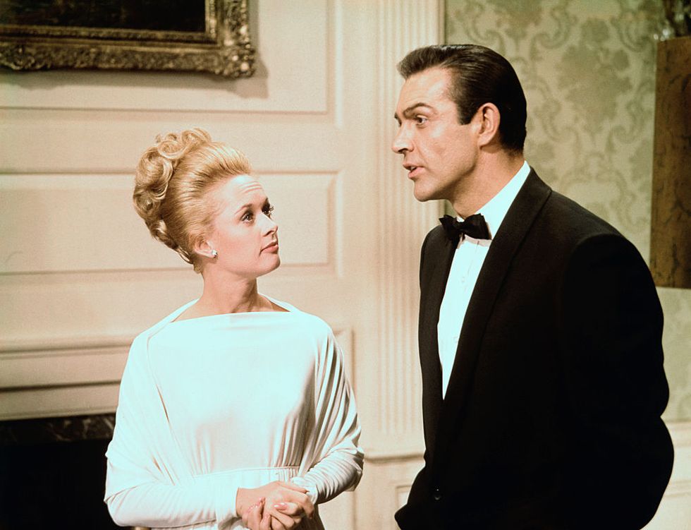 original caption movie still of a scene in alfred hitchcocks marnie, sex mystery starring tippi hedren and sean connery, a universal release, in technicolor sean connery tells tippi hedren he is proud of the way she has carried out her confrontation with an embarrassing guest they are seen from the waist up