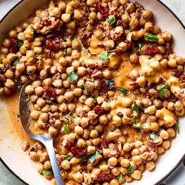 marry me chickpeas topped with basil